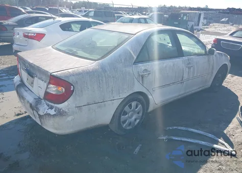 2002 Toyota Camry Le z USA, uszkodzony, nr VIN JTDBE32K620087402